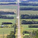 Northern Alberta.  A mix of Boreal forest and farmland.