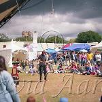 Do you remember when the Fringe Festival was held east of 103 st?  Here's a perfomer behind King Edward School. c1991.